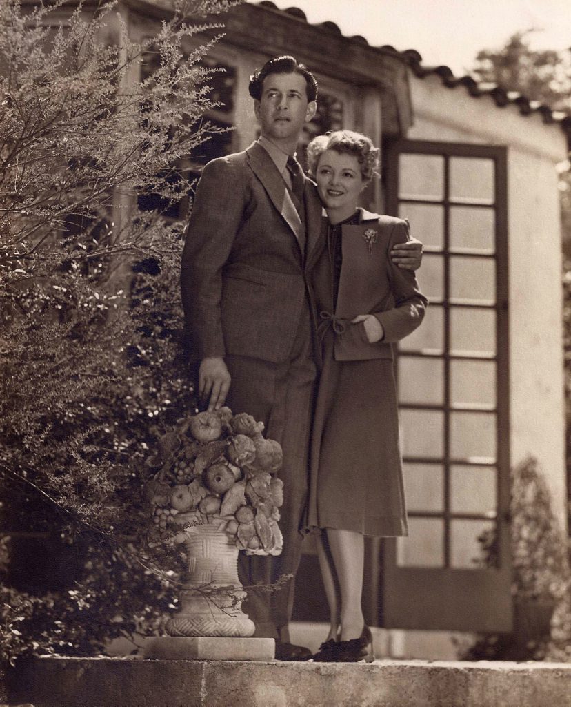 Janet Gaynor and Adrian in the yard